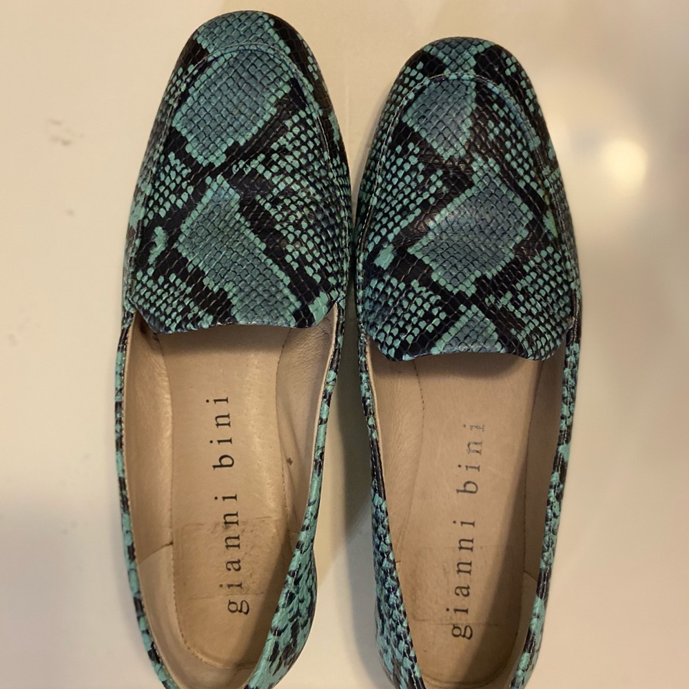 Moccasin style flats, animal print.